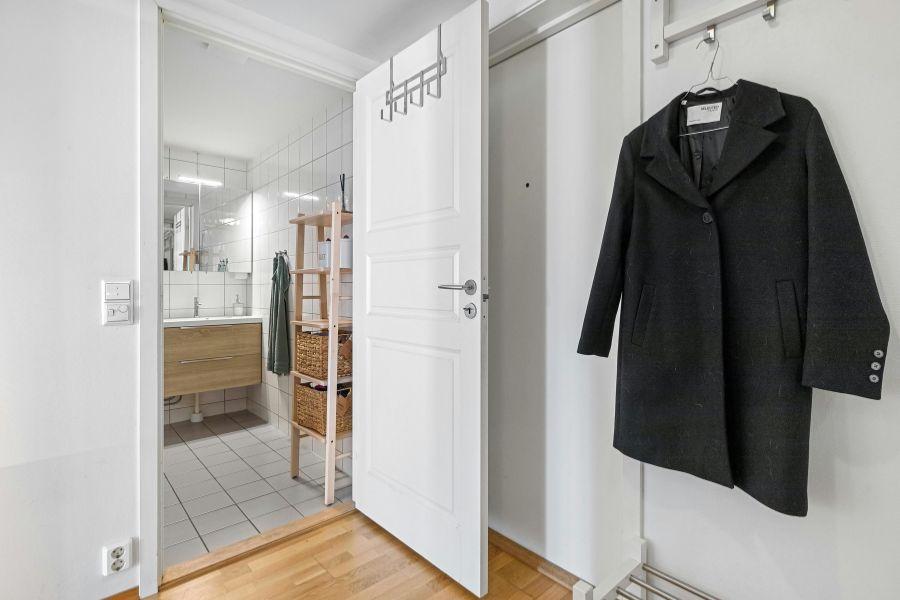 Hang a Heavy Towel or Blanket Over the Door